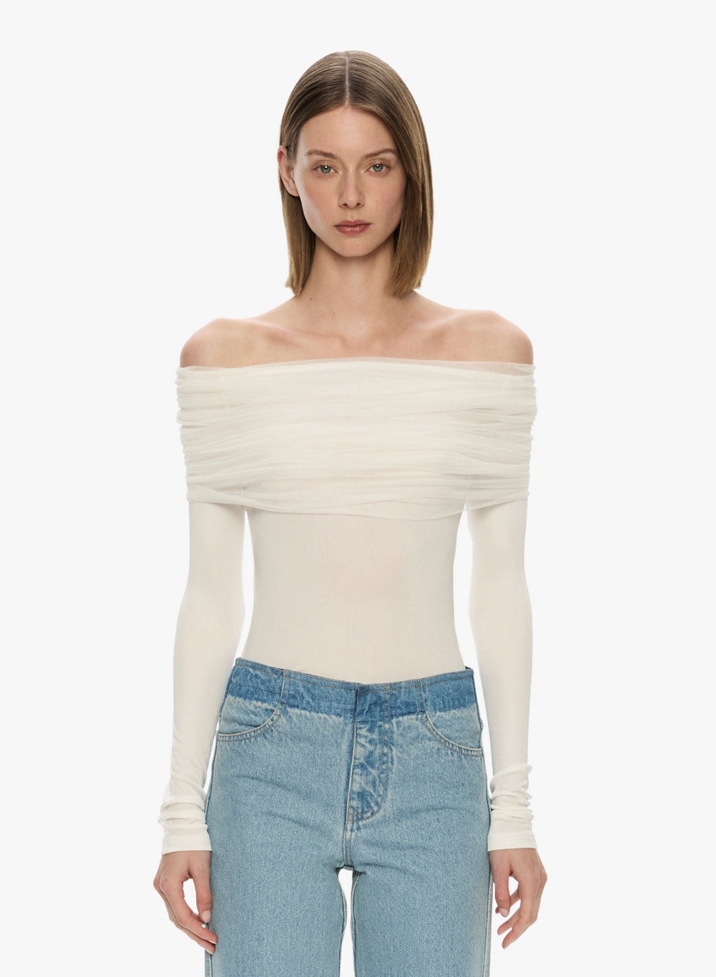 Image of a model wearing Tops. Productname: Christopher Esber Sonora Veiled Long Sleeve Top in White colour by brand - Christopher Esber