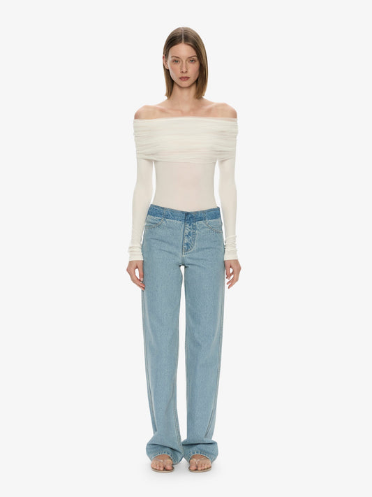 Image of a model wearing Tops. Productname: Christopher Esber Sonora Veiled Long Sleeve Top in White colour by brand - Christopher Esber