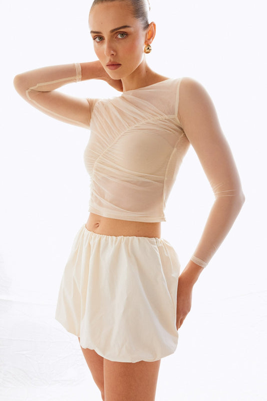 Image of a model wearing Skirts. Productname: SNDYS Freja Bubble Skirt in Chalk colour by brand - SNDYS