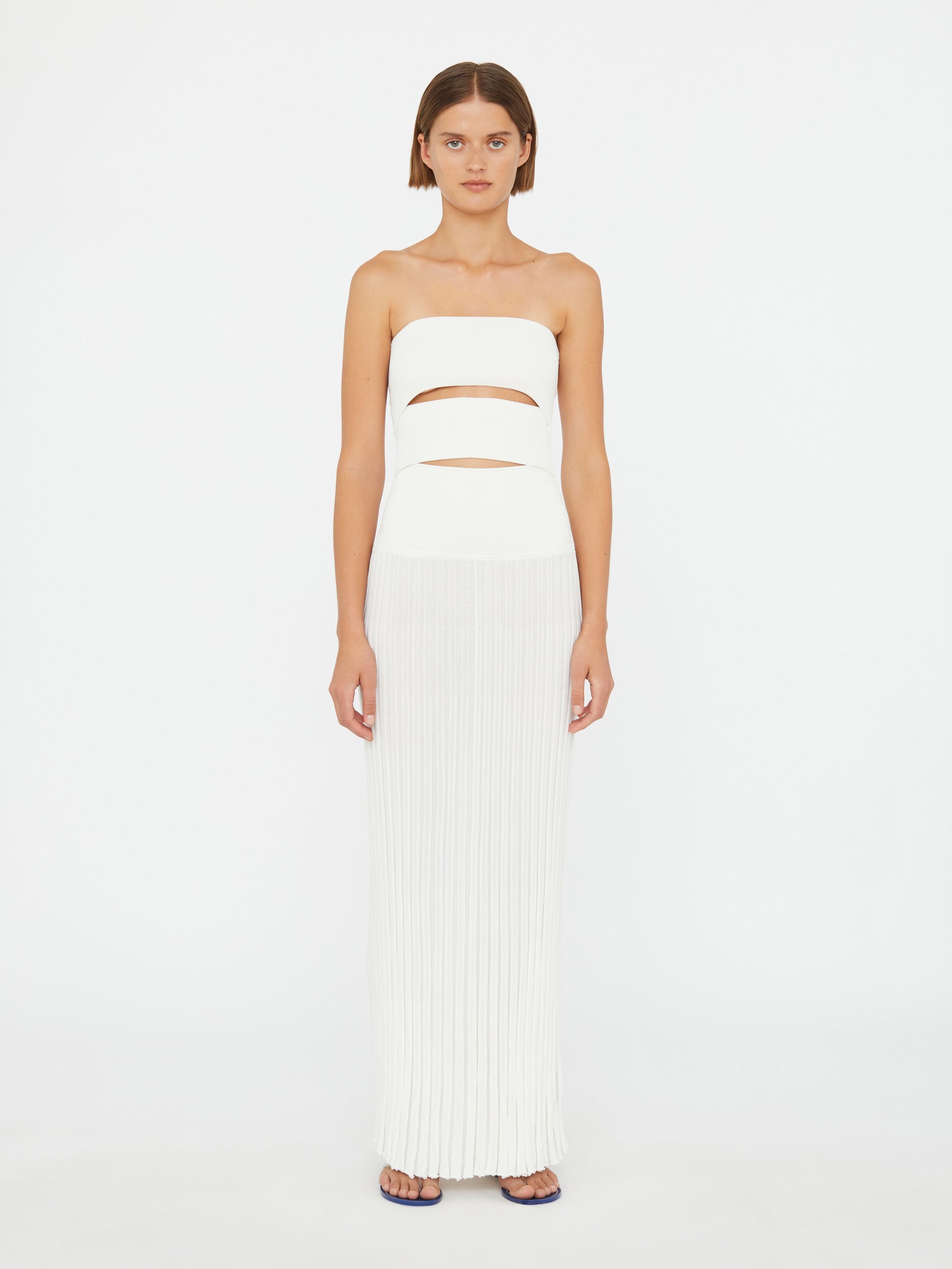Image of Dresses. Product name - Slashed Knit Sunray Strapless Dress in White colour by brand - CHRISTOPHER ESBER