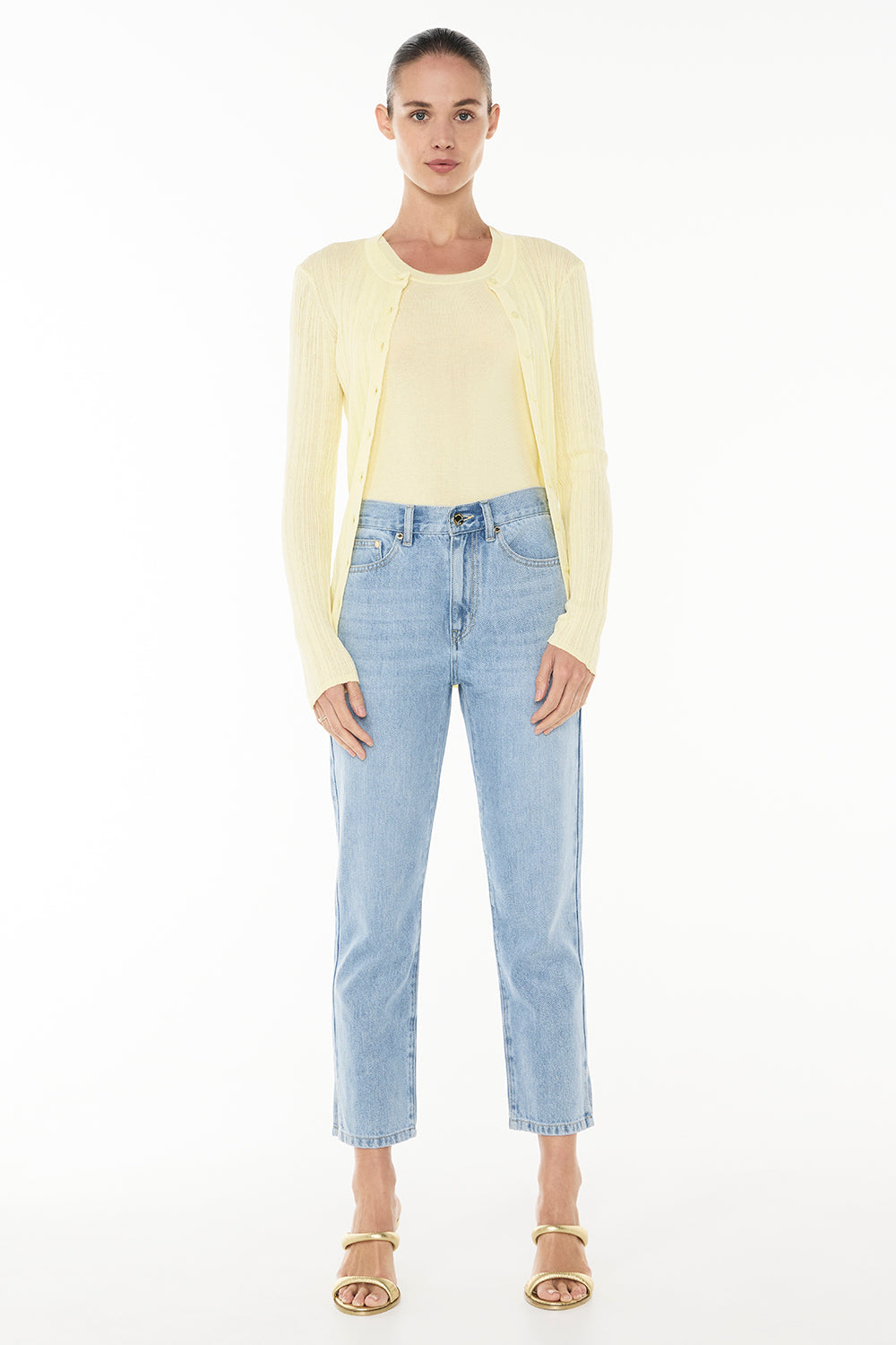 Image of a model wearing Outerwear. Productname: Day Glow Cardigan in PALE YELLOW colour by brand - Manning Cartell