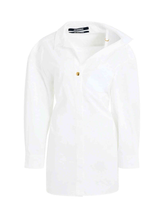 Image of a model wearing Dress. Productname: JACQUEMUS La Mini Robe Chemise Dress in White colour by brand - JACQUEMUS