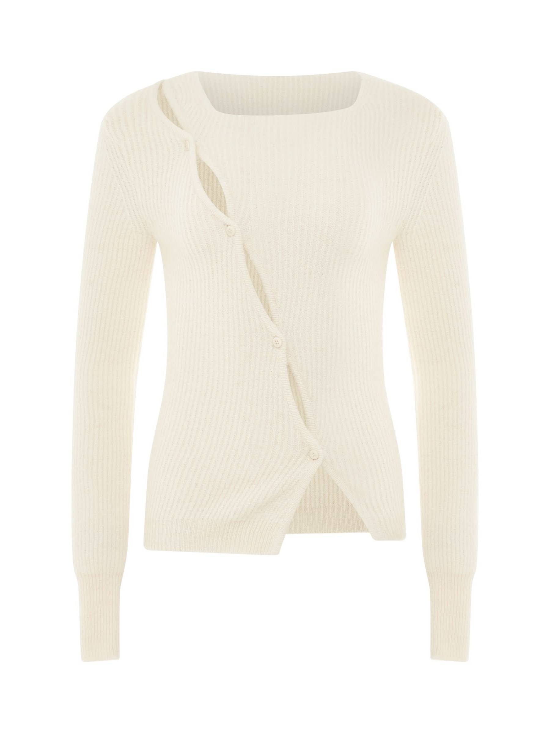 Image of a model wearing Outerwear. Productname: JACQUEMUS Pau Asymmetric Cardigan in Light Beige colour by brand - JACQUEMUS