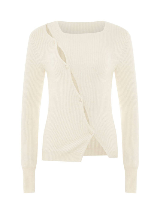 Image of a model wearing Outerwear. Productname: JACQUEMUS Pau Asymmetric Cardigan in Light Beige colour by brand - JACQUEMUS