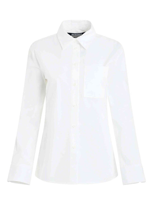 Image of a model wearing Tops. Productname: JACQUEMUS De Costume Shirt in White colour by brand - JACQUEMUS