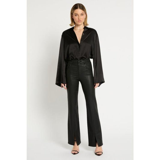 Image of a model wearing Denim. Productname: Front Split Waxy Jean in Black colour by brand - sass and bide