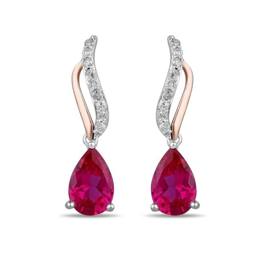 Image of Earrings. Productname: Pear Shaped Created Ruby Stud Earrings with 0.15ct of Diamonds in Sterling Silver and 9kt Rose Gold in Diamond colour by brand - Bevilles