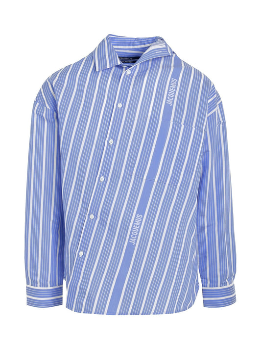 Image of a model wearing Tops. Productname: JACQUEMUS Cuadro Asymmetric Shirt in BLUE colour by brand - JACQUEMUS