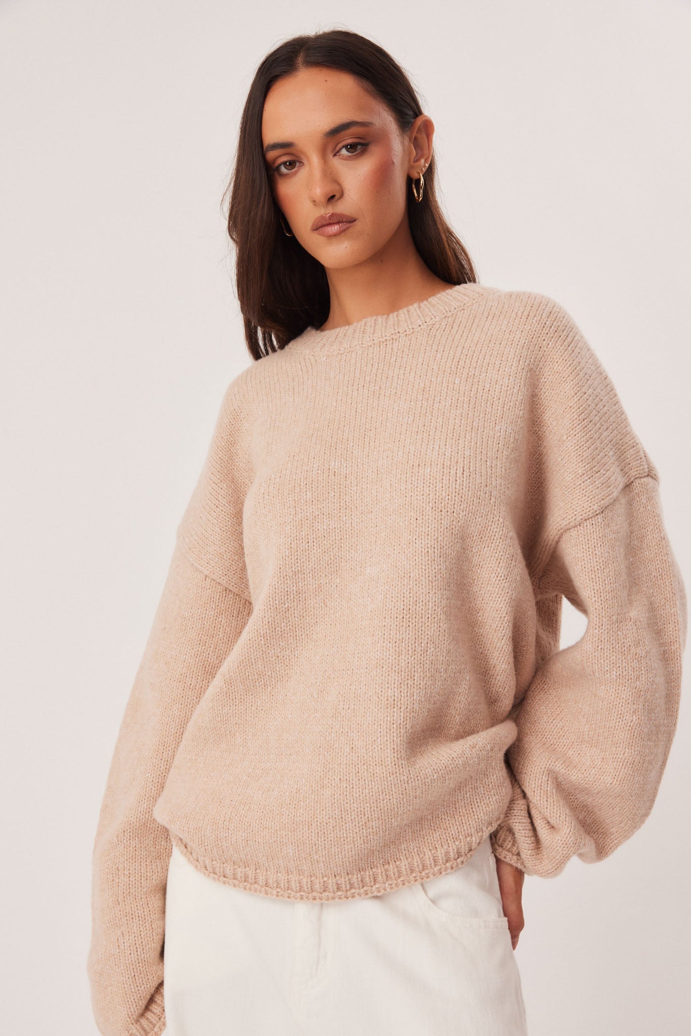 Image of a model wearing Outerwear. Productname: SNDYS ZOYA KNIT JUMPER in Beige Marl colour by brand - SNDYS