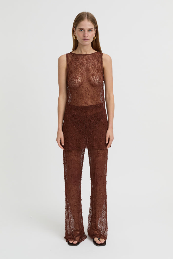 Image of a model wearing Tops. Product name - Riven Tank Brown in Brown colour by brand - Blanca Studio
