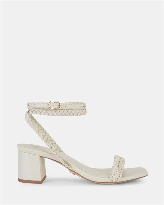 Image of Sandals. Product name - Usuki Women's Strappy Low Heel CREAM Novo Sandals in Cream colour by brand - NOVO