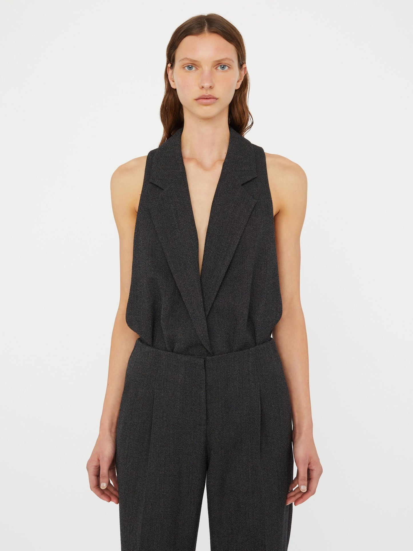 Image of a model wearing Tops. Productname: Christopher Esber Facile Tailored Twill Bodysuit in Black colour by brand - Christopher Esber