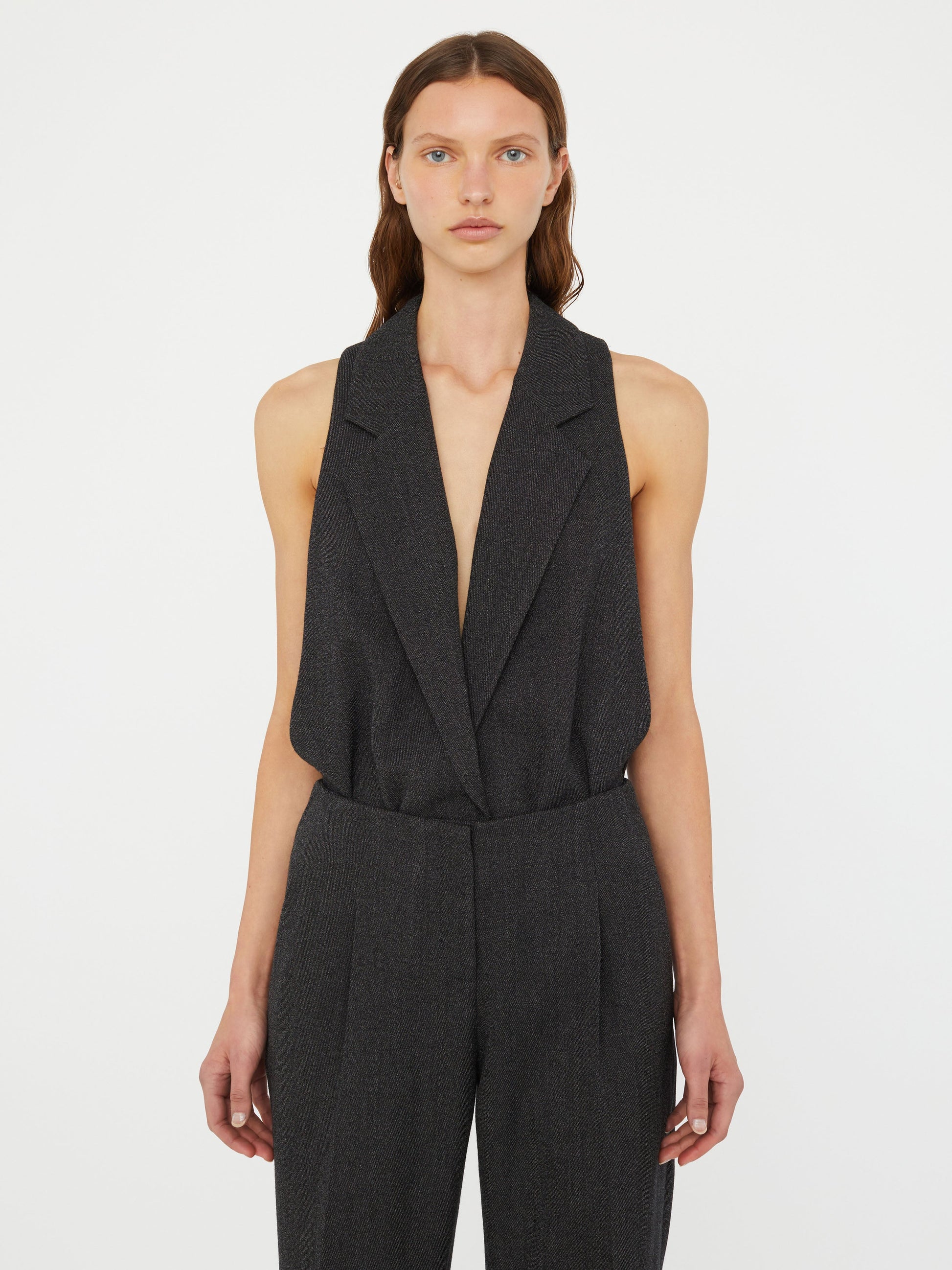 Image of a model wearing Tops. Productname: Christopher Esber Facile Tailored Twill Bodysuit in Black colour by brand - Christopher Esber