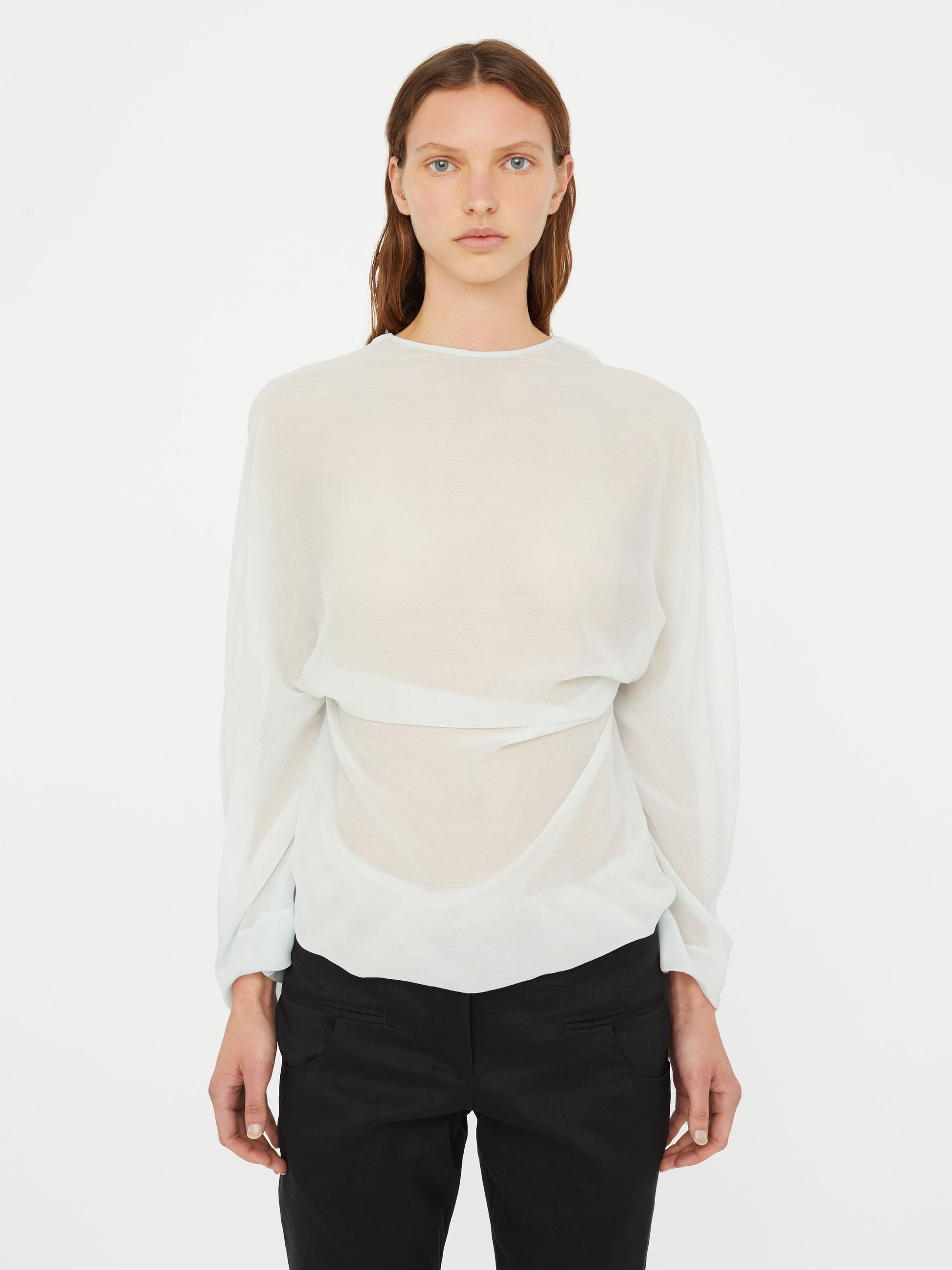 Image of a model wearing Tops. Product name - Latticed Lace Shrug Top in Top colour by brand - Christopher Esber