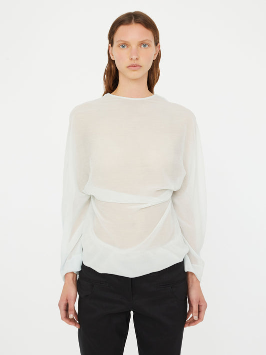 Image of a model wearing Tops. Product name - Latticed Lace Shrug Top in Top colour by brand - Christopher Esber