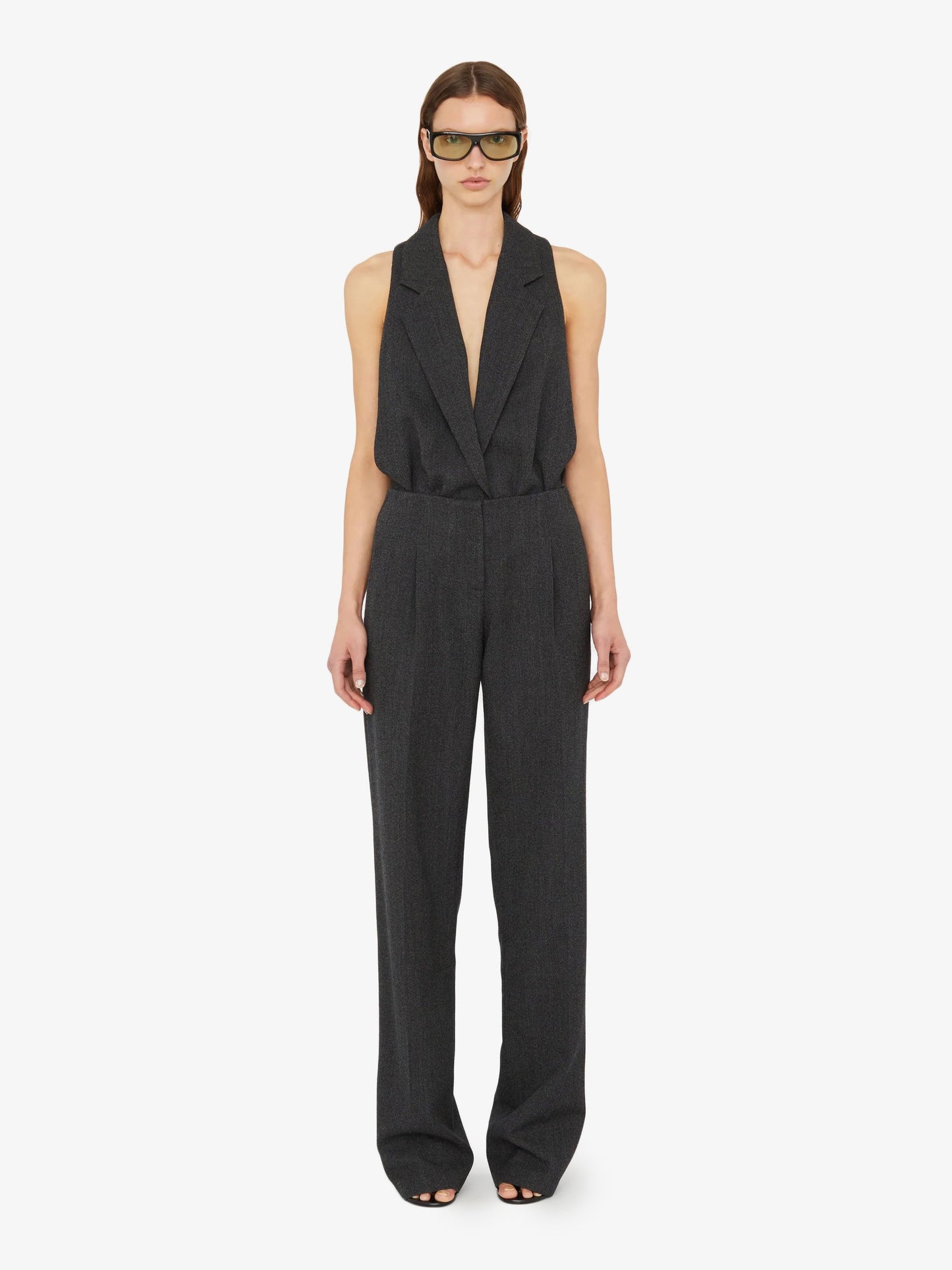 Image of a model wearing Pants. Product name - Redux Twill Trouser in Black colour by brand - Christopher Esber