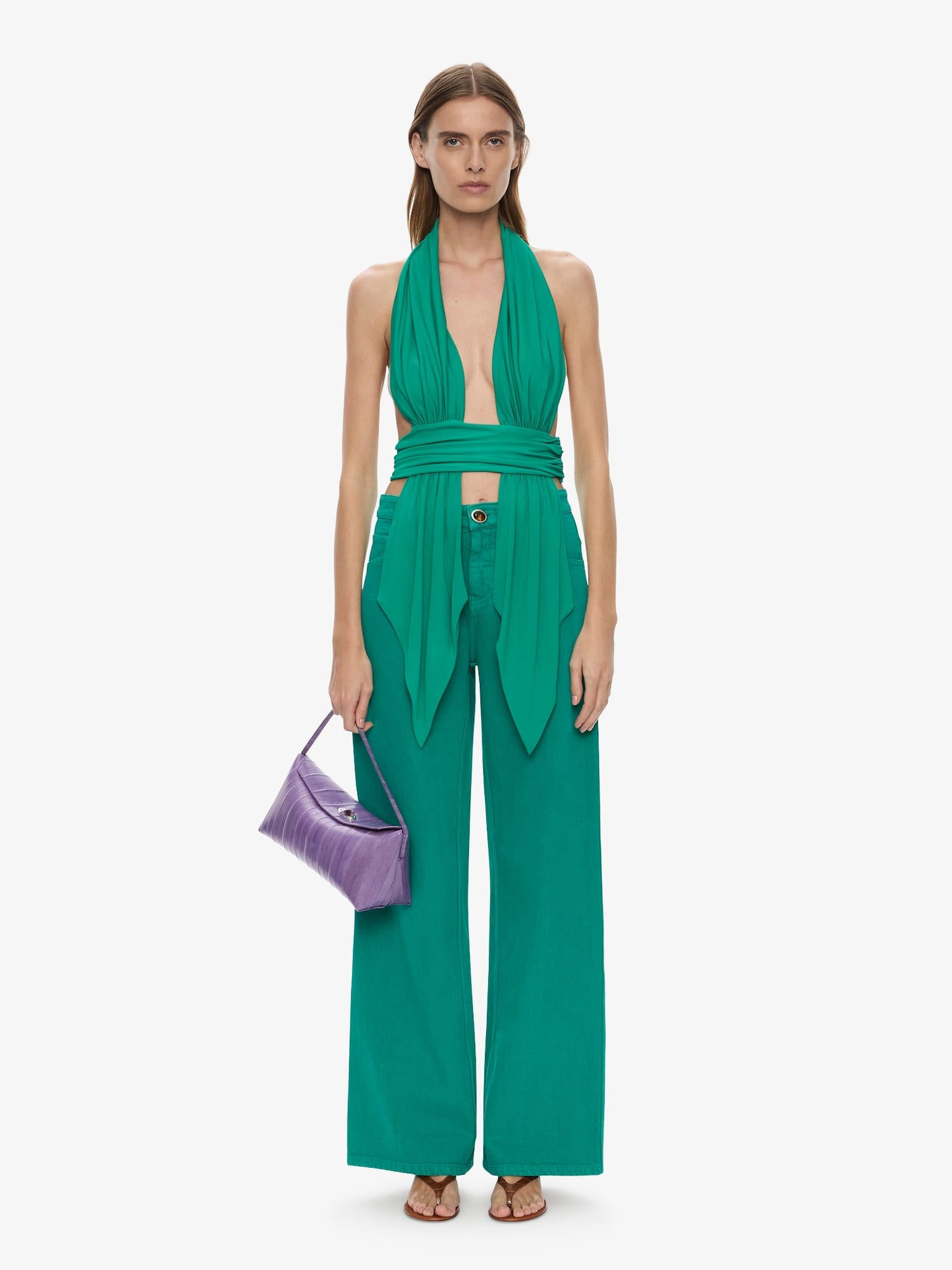 Image of a model wearing Pants. Product name - Relaxed Denim Quartz Jean in Malachite colour by brand - CHRISTOPHER ESBER