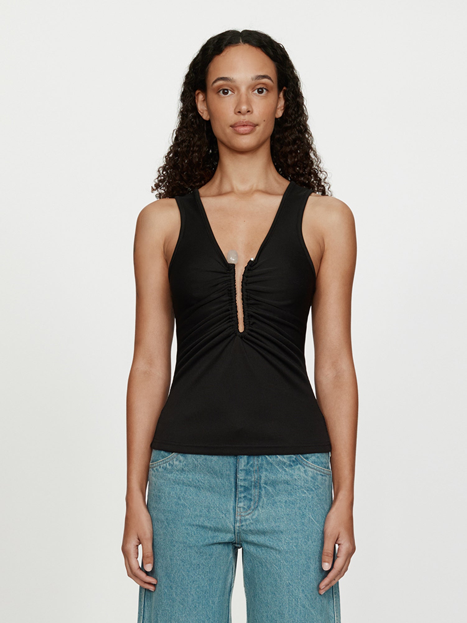 Image of a model wearing Tops. Productname: Christopher Esber Crystal Pin Tank in Black colour by brand - Christopher Esber