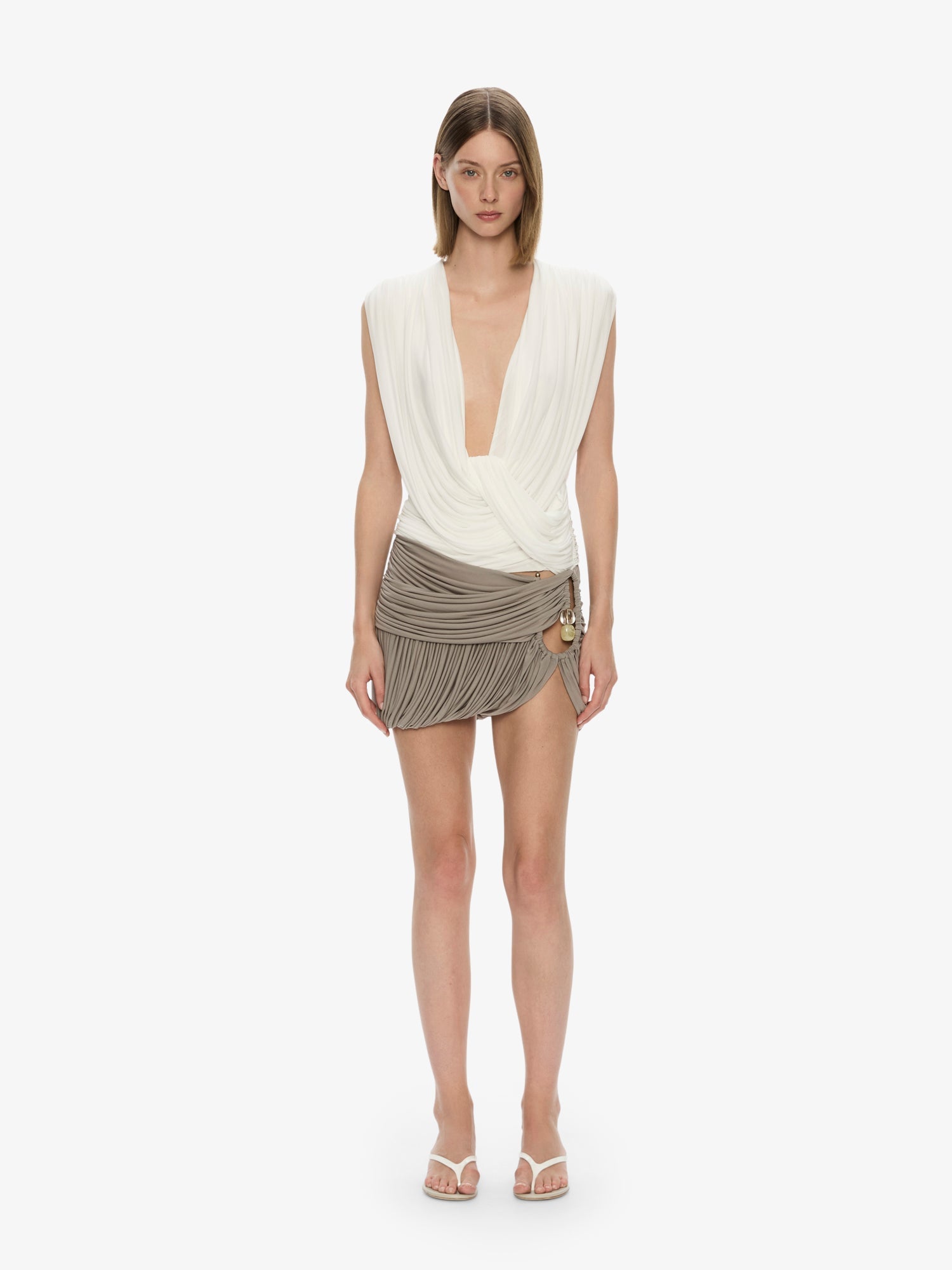 Image of a model wearing Skirts. Productname: CHRISTOPHER ESBER Beach Glass Bubble Mini Skirt in Slate colour by brand - CHRISTOPHER ESBER