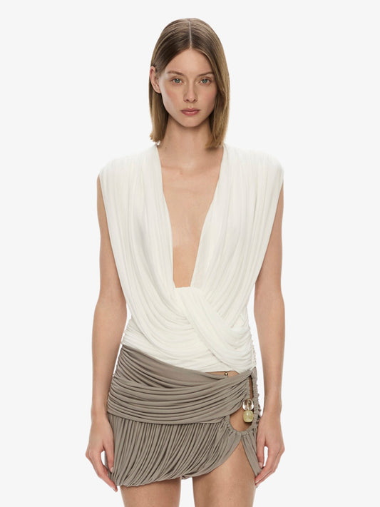 Image of a model wearing Tops. Productname: Ripple Drape Top in White colour by brand - CHRISTOPHER ESBER