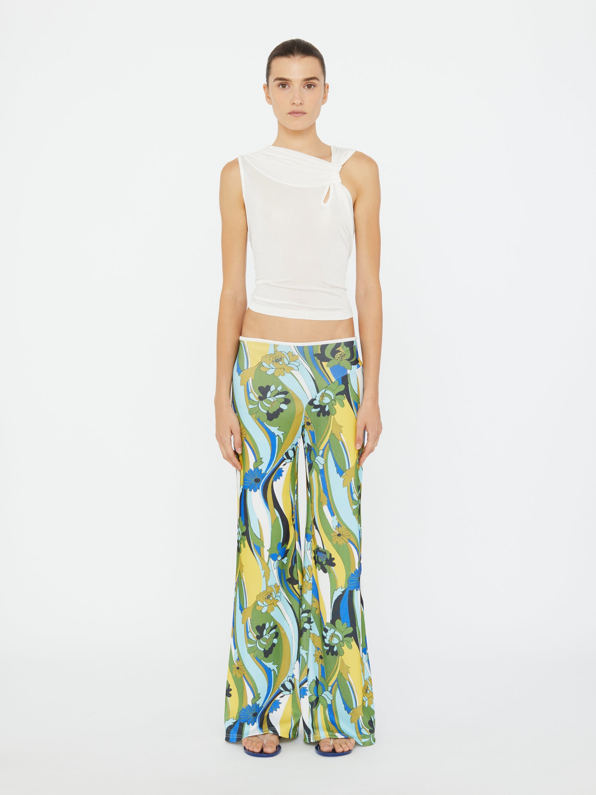 Image of a model wearing Pants. Productname: Christopher Esber Acidic Floral Rib Pant in Print colour by brand - Christopher Esber