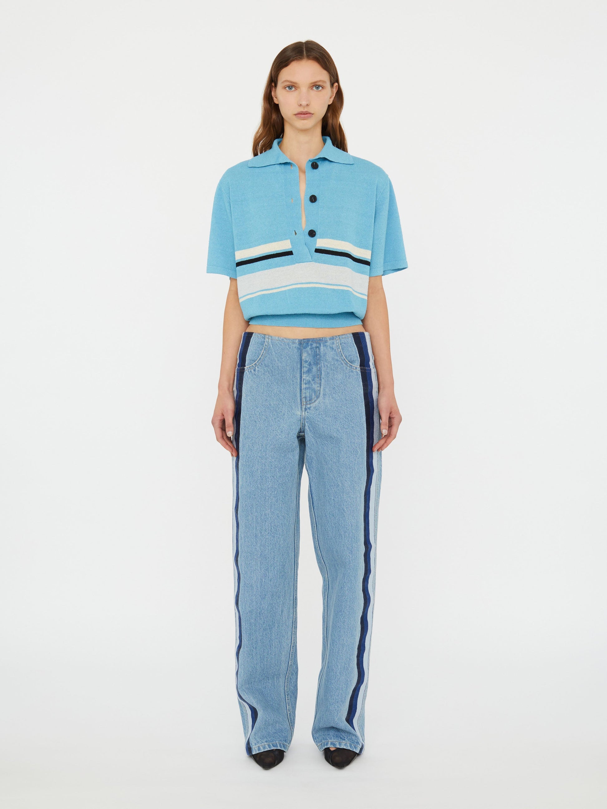 Image of a model wearing Denim. Productname: Christopher Esber Streaked Denim Jean in Jean colour by brand - Christopher Esber