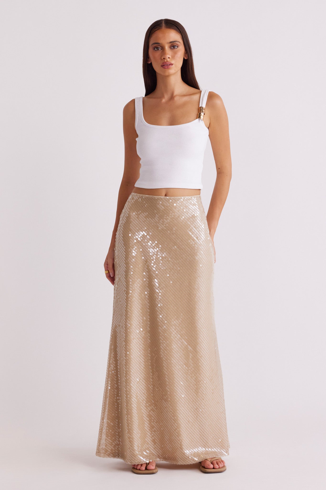 Image of a model wearing Skirts. Productname: SNDYS CALLIOPE MAXI SKIRT in Mocha colour by brand - SNDYS