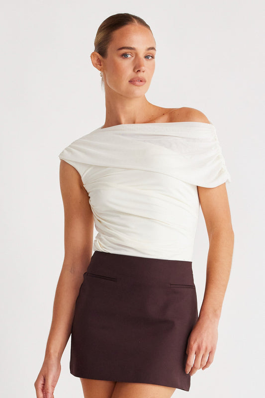 Image of a model wearing Tops. Productname: SNDYS ZAYA TOP in Off White colour by brand - SNDYS