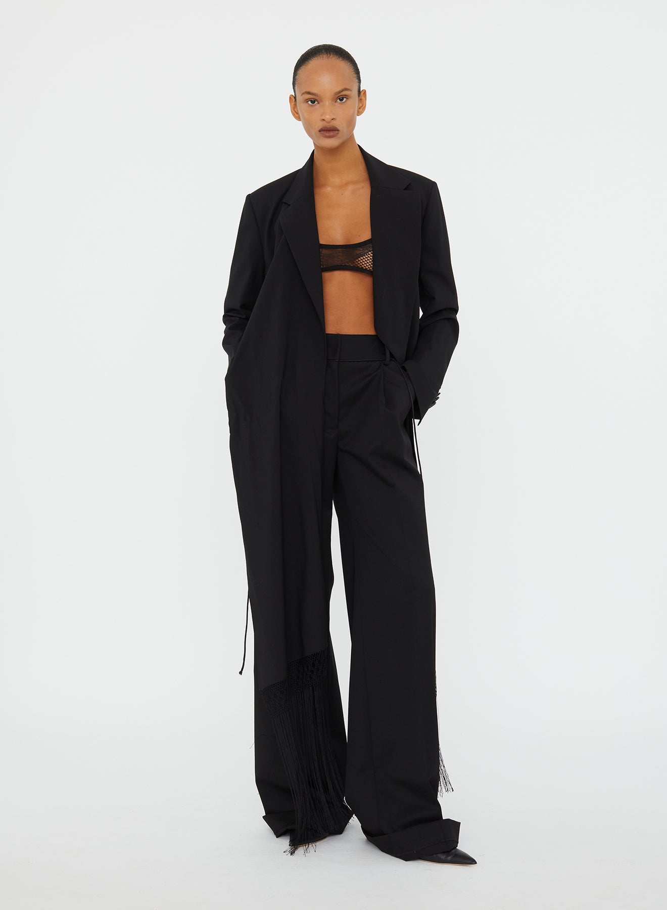 Image of a model wearing Pants. Productname: CHRISTOPHER ESBER Didion Tailored Trouser in Black colour by brand - CHRISTOPHER ESBER