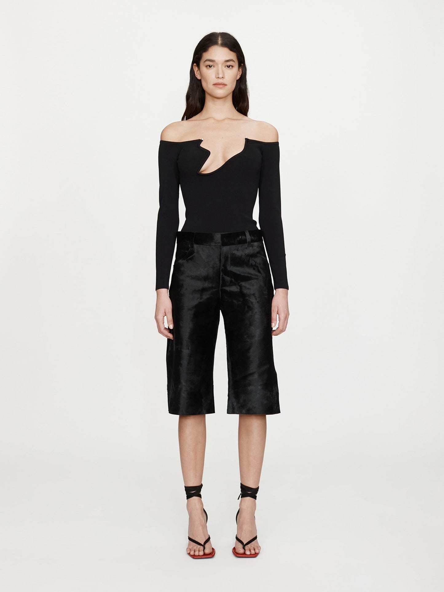 Image of a model wearing Shorts. Productname: CHRISTOPHER ESBER Elson Pony Short in Black colour by brand - CHRISTOPHER ESBER