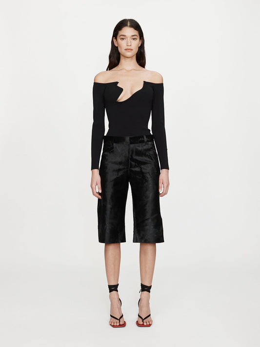 Image of a model wearing Shorts. Productname: CHRISTOPHER ESBER Elson Pony Short in Black colour by brand - CHRISTOPHER ESBER