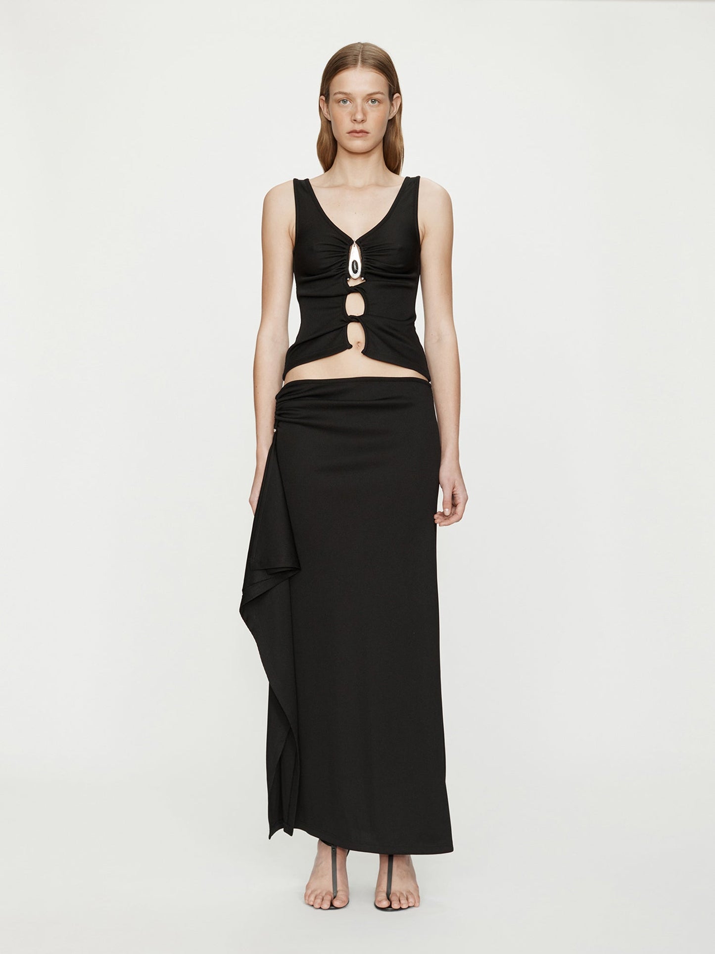 Image of a model wearing Skirts. Productname: CHRISTOPHER ESBER Crystal Pendant Cascade Skirt in Black colour by brand - CHRISTOPHER ESBER