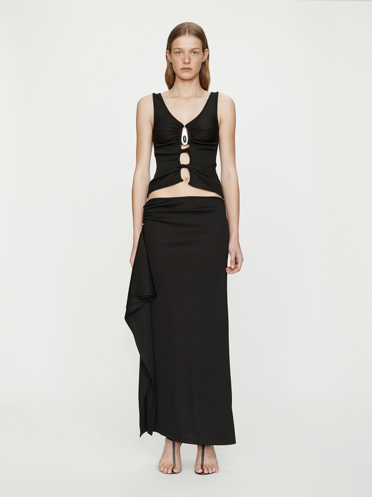 Image of a model wearing Skirts. Productname: CHRISTOPHER ESBER Crystal Pendant Cascade Skirt in Black colour by brand - CHRISTOPHER ESBER