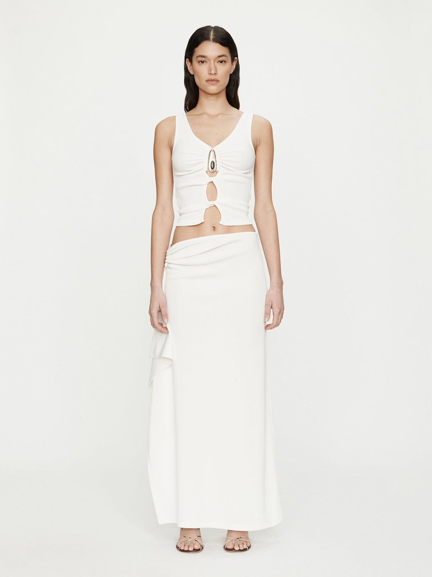 Image of a model wearing Skirts. Productname: CHRISTOPHER ESBER Crystal Pendant Cascade Skirt in White colour by brand - CHRISTOPHER ESBER