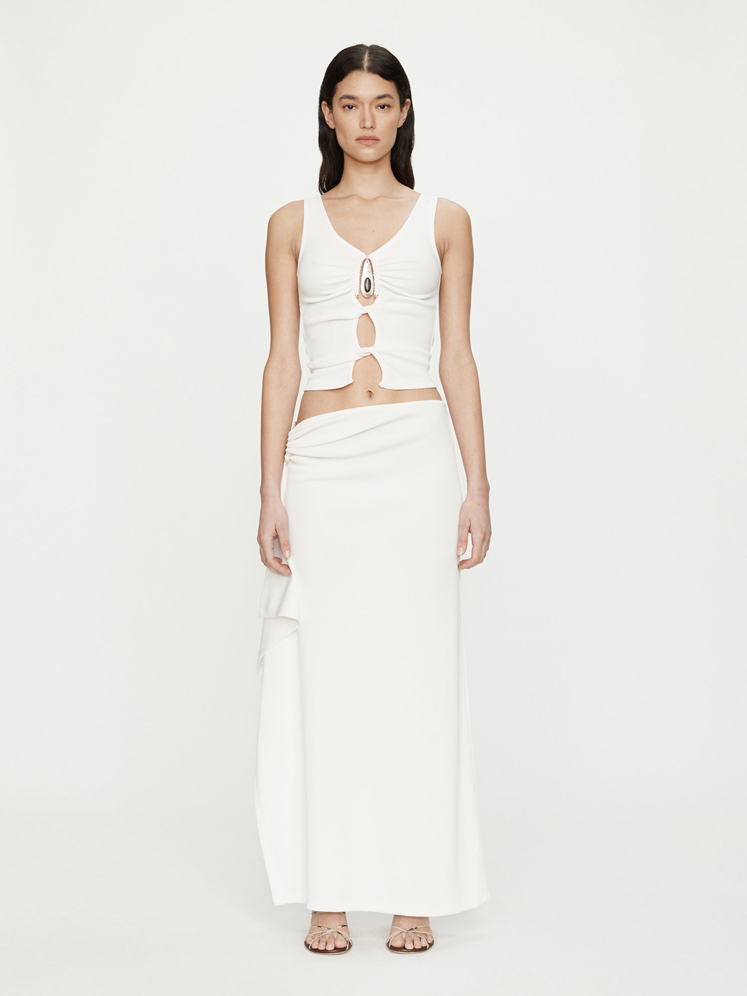 Image of a model wearing Skirts. Productname: CHRISTOPHER ESBER Crystal Pendant Cascade Skirt in White colour by brand - CHRISTOPHER ESBER