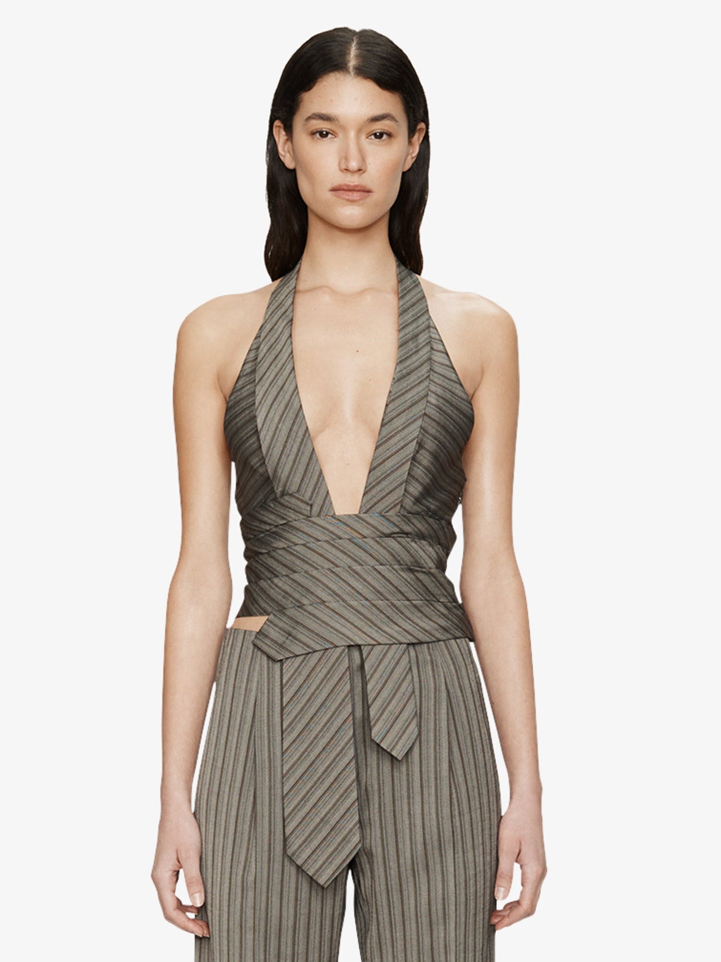Image of a model wearing Tops. Product name - Reyer Tailored Tie Top in Stripe colour by brand - CHRISTOPHER ESBER