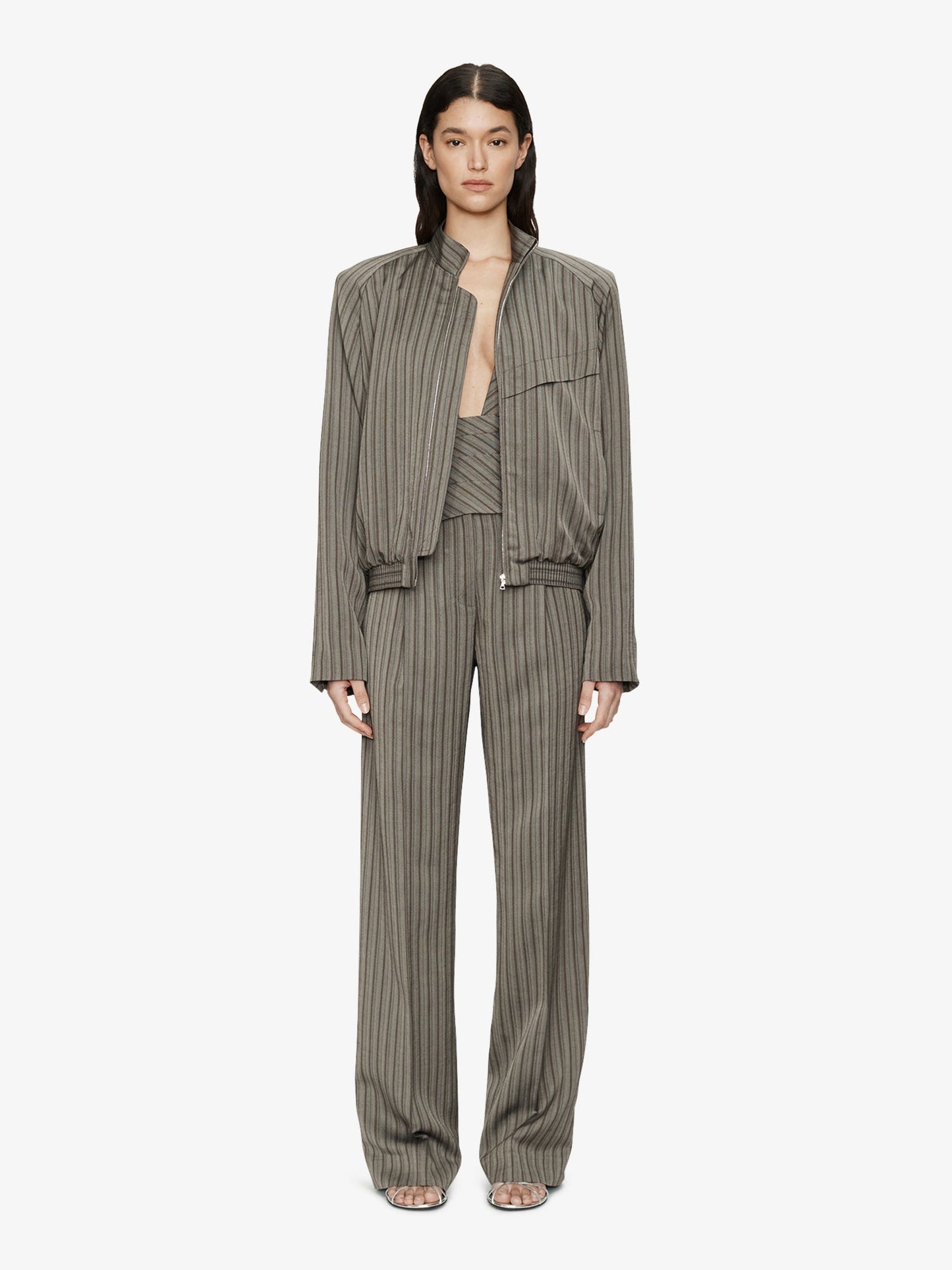 Image of a model wearing Pants. Product name - Reyer Tailored Redux Trouser in Stripe colour by brand - CHRISTOPHER ESBER