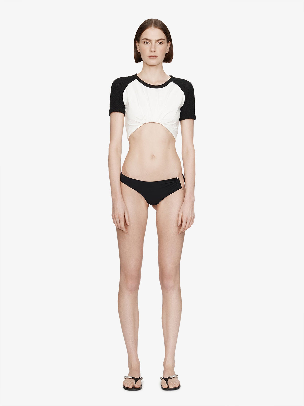 Image of a model wearing Tops. Product name - Tucked Ringer Jersey Tee in White colour by brand - CHRISTOPHER ESBER