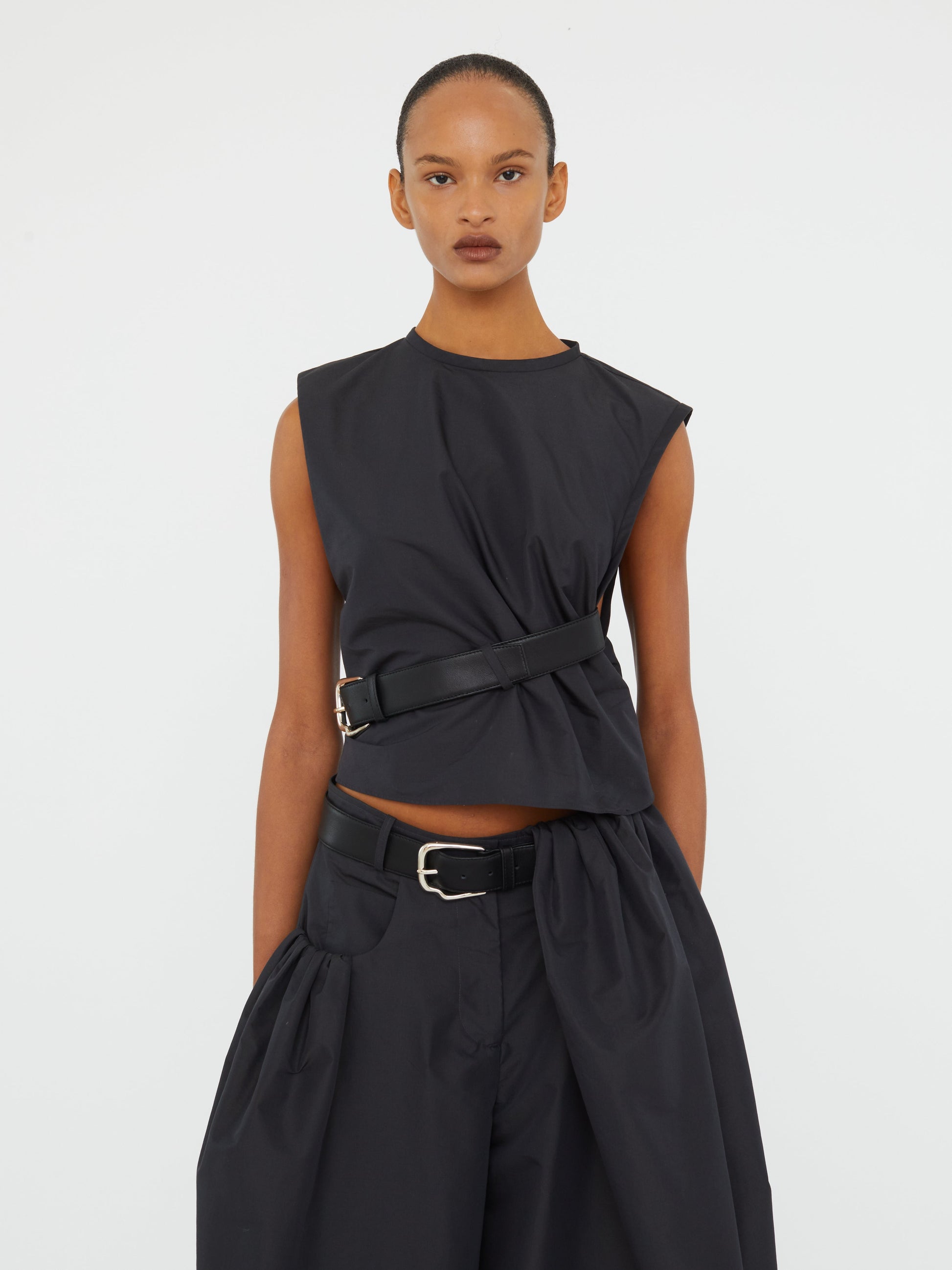 Image of a model wearing Tops. Productname: CHRISTOPHER ESBER Locus Belted Taffeta Tank in Carbon colour by brand - CHRISTOPHER ESBER