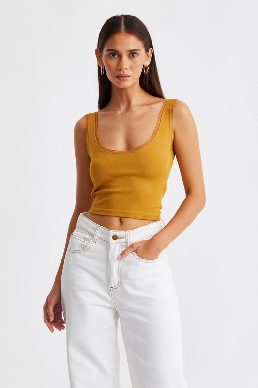 Image of a model wearing Tops. Productname: SNDYS Delphine Tank in Cognac colour by brand - SNDYS