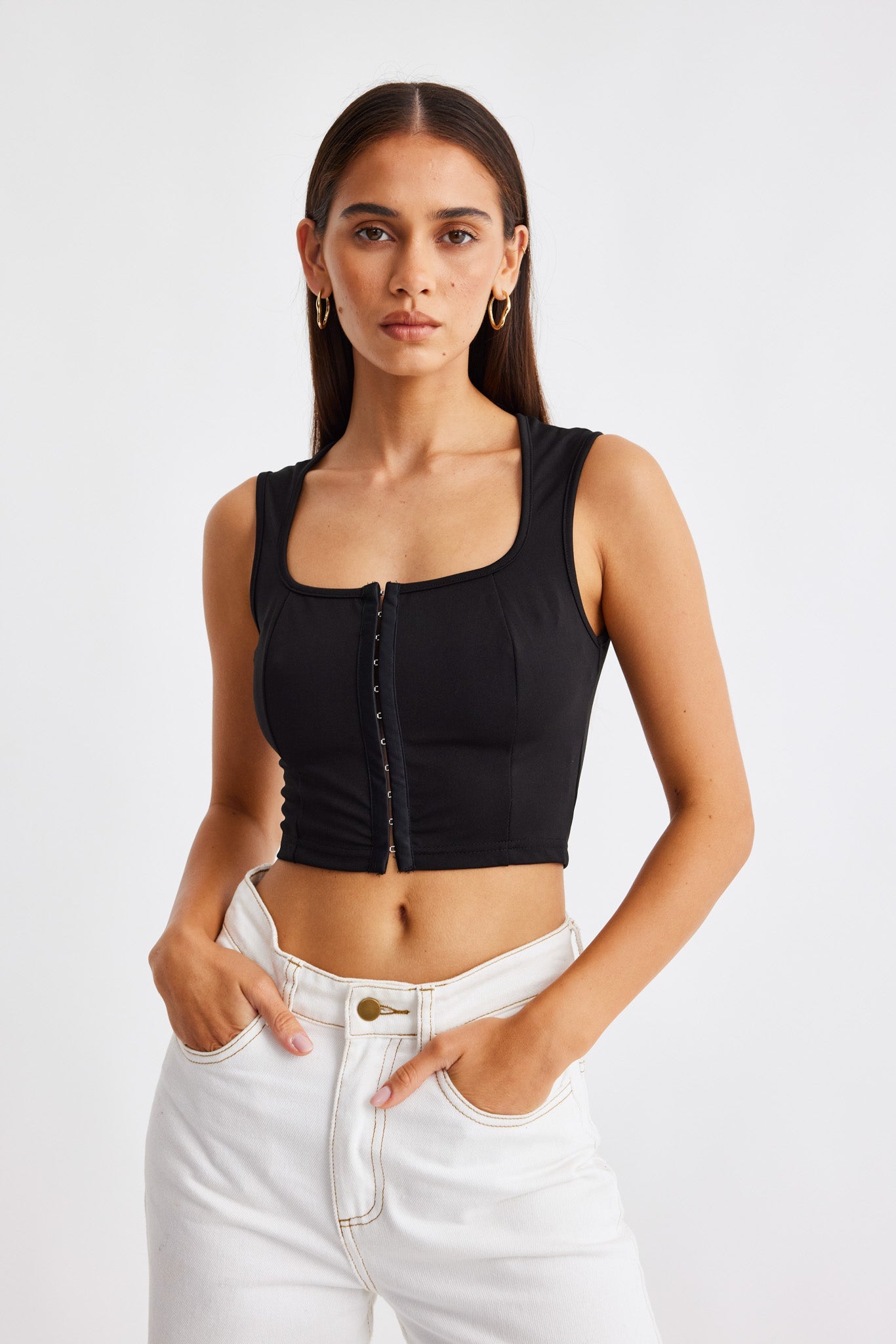 Image of a model wearing Tops. Productname: SNDYS CAPRI TOP in Black colour by brand - SNDYS