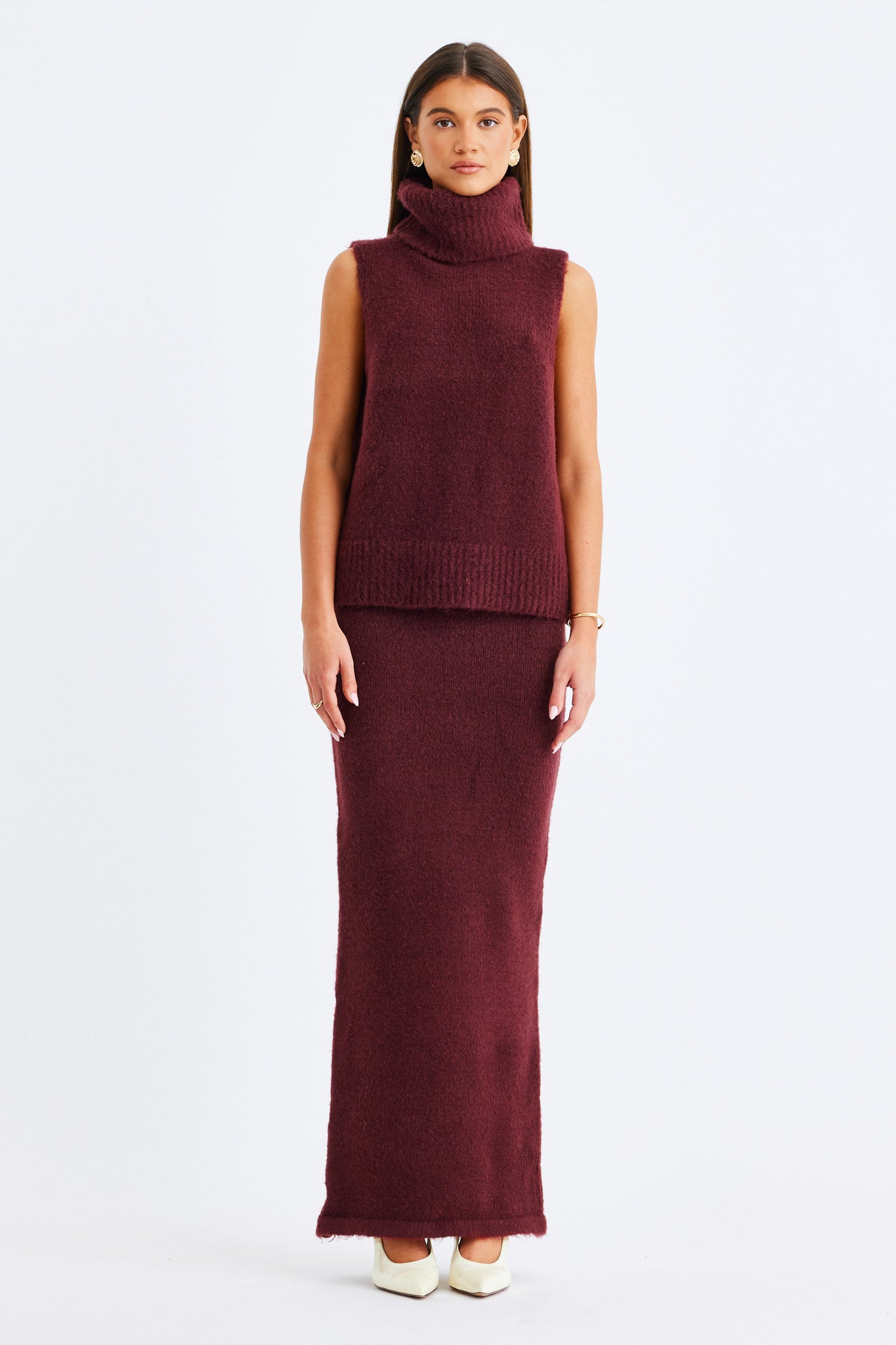 Image of a model wearing Skirts. Productname: SNDYS WINNIE MAXI SKIRT in Cherry colour by brand - SNDYS