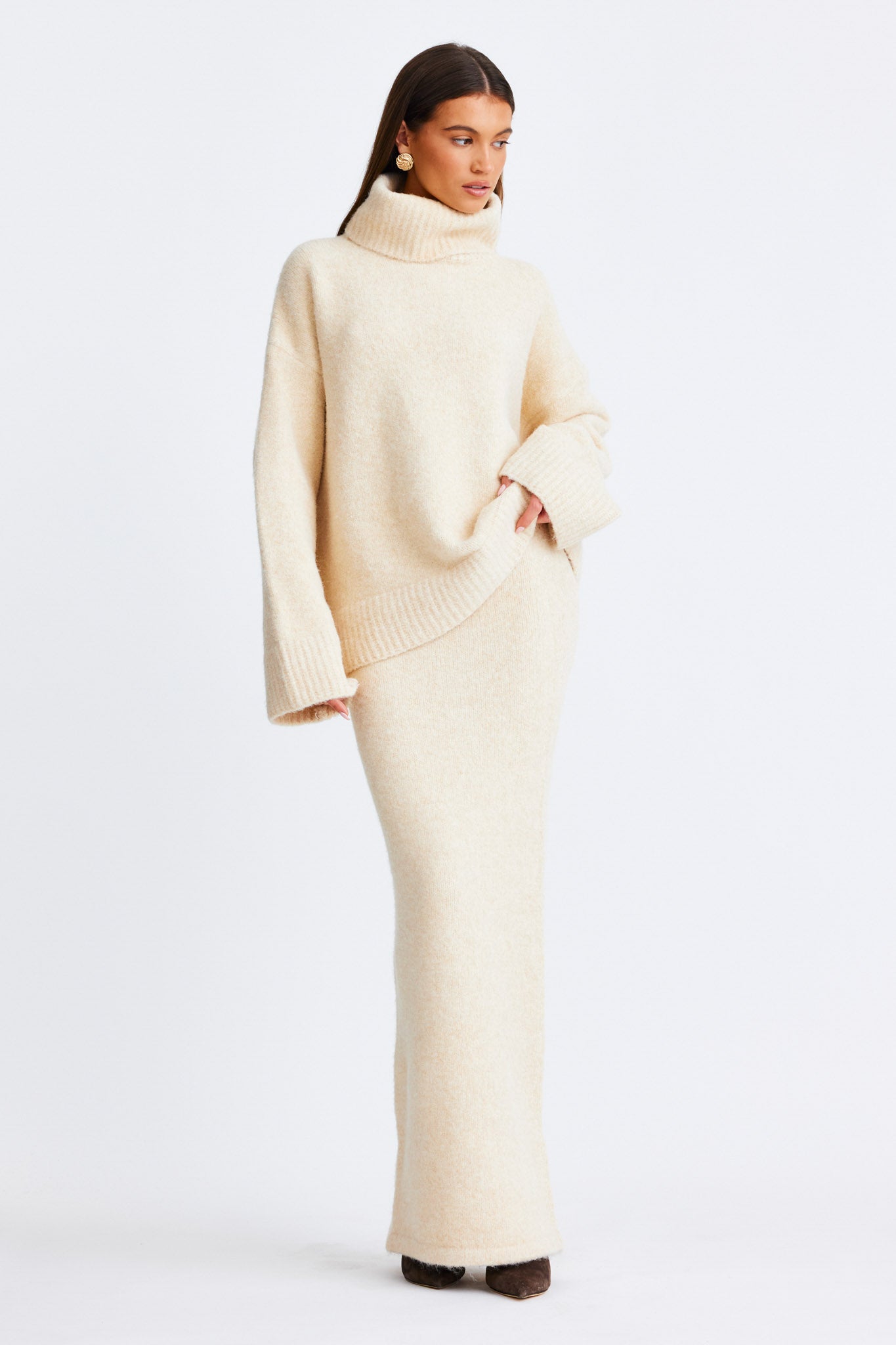 Image of a model wearing Skirts. Productname: SNDYS WINNIE MAXI SKIRT in Cream colour by brand - SNDYS
