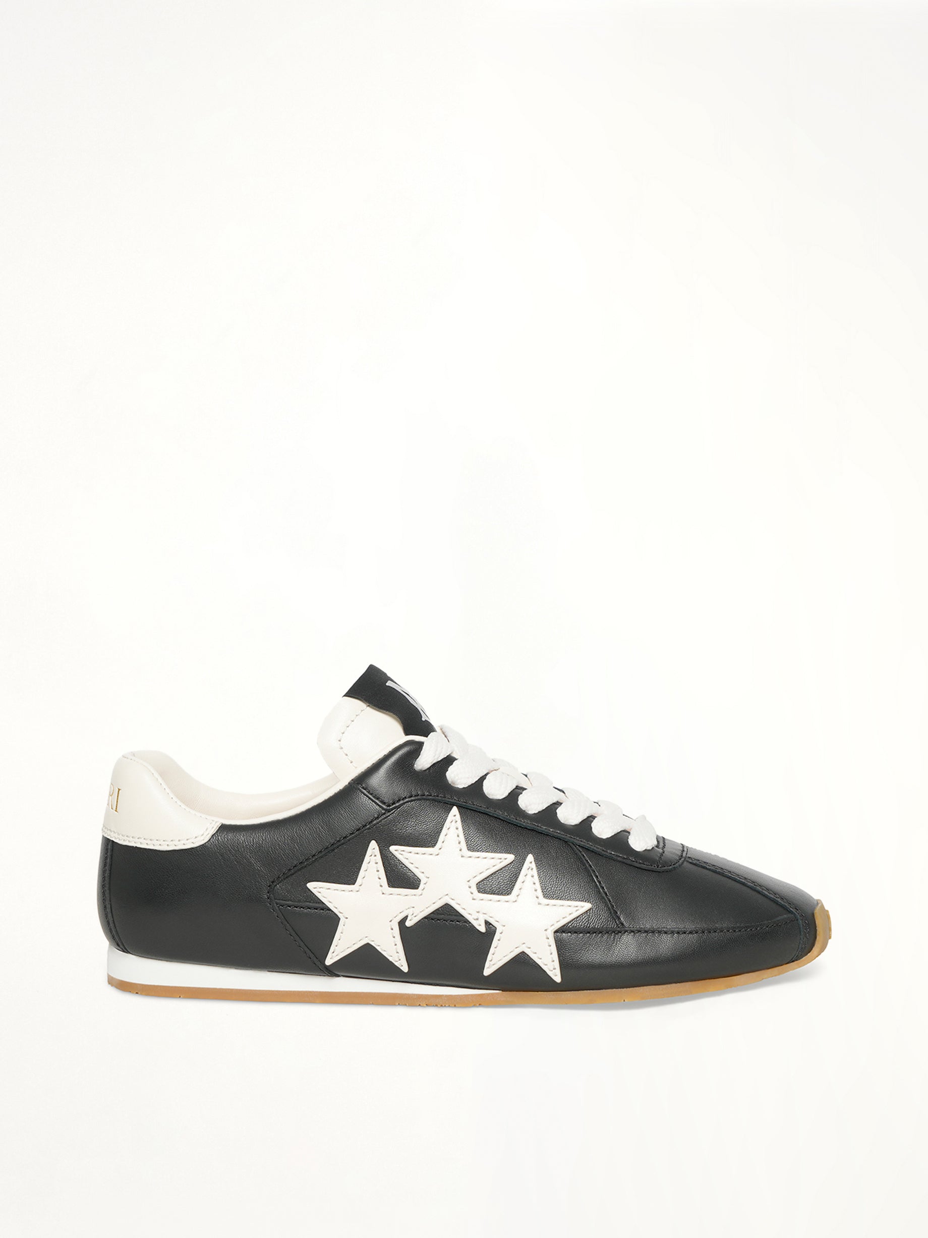 Image of Sneakers. Product name - Pacific Slim Sneaker in Black colour by brand - AMIRI