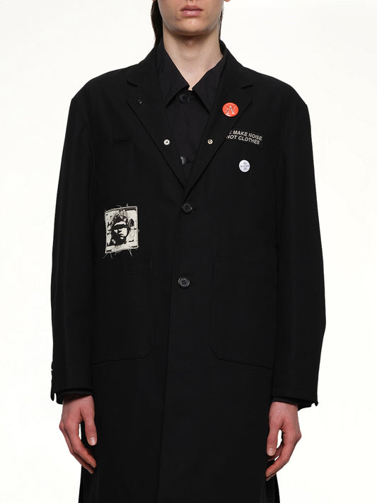 Image of a model wearing Outerwear. Product name - Undercover Coat in Black colour by brand - UNDERCOVER
