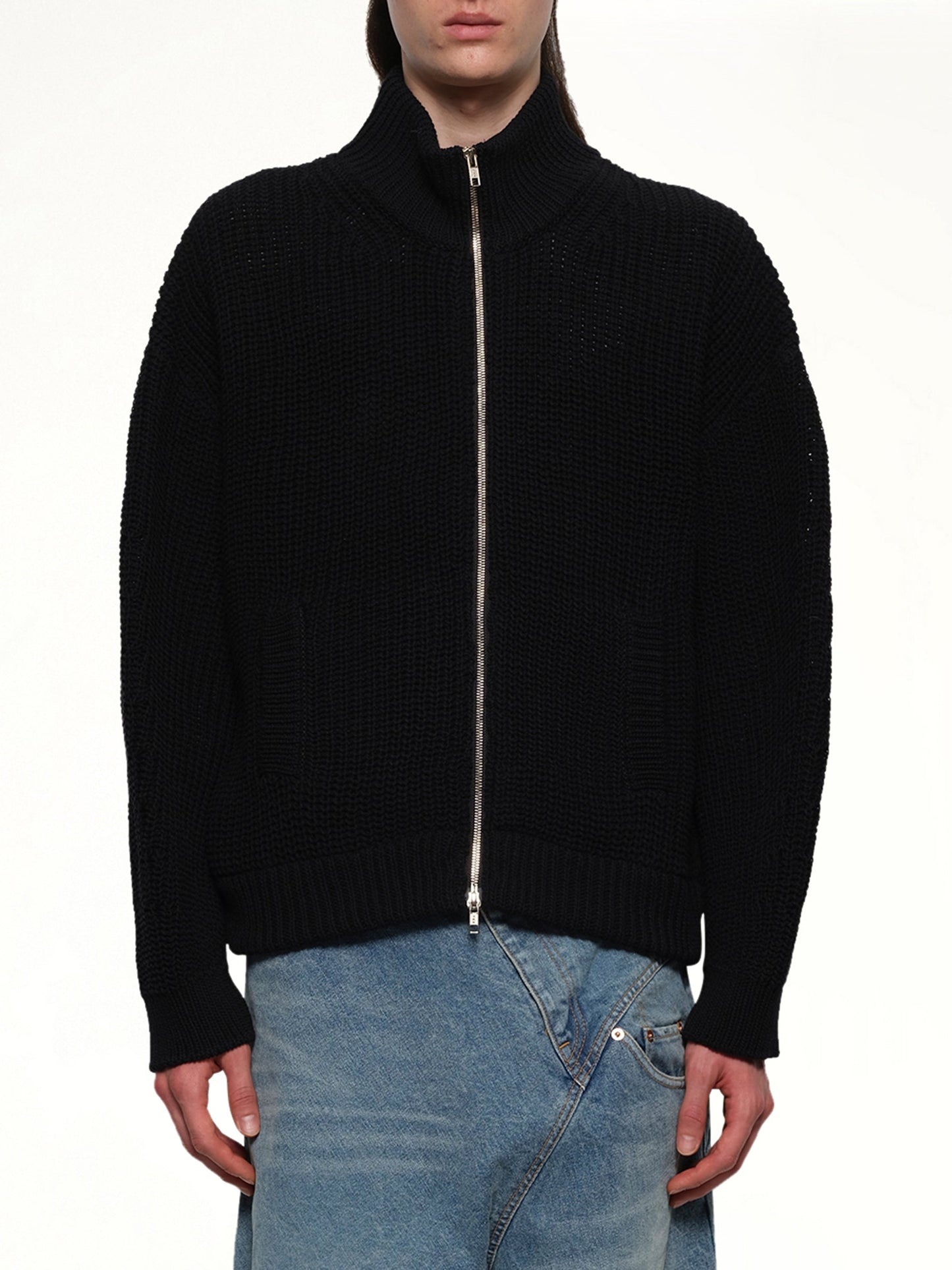 Image of a model wearing Tops. Productname: DOUBLET Bounce Fusion Drivers Knit in BLACK colour by brand - DOUBLET