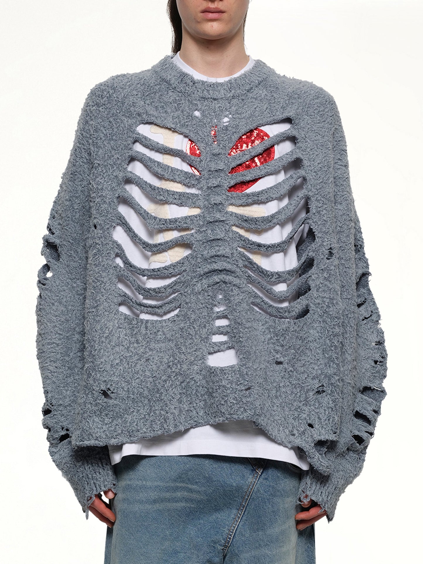 Image of a model wearing Outerwear. Productname: DOUBLET Ribcage Knit Pullover in BLUE colour by brand - DOUBLET