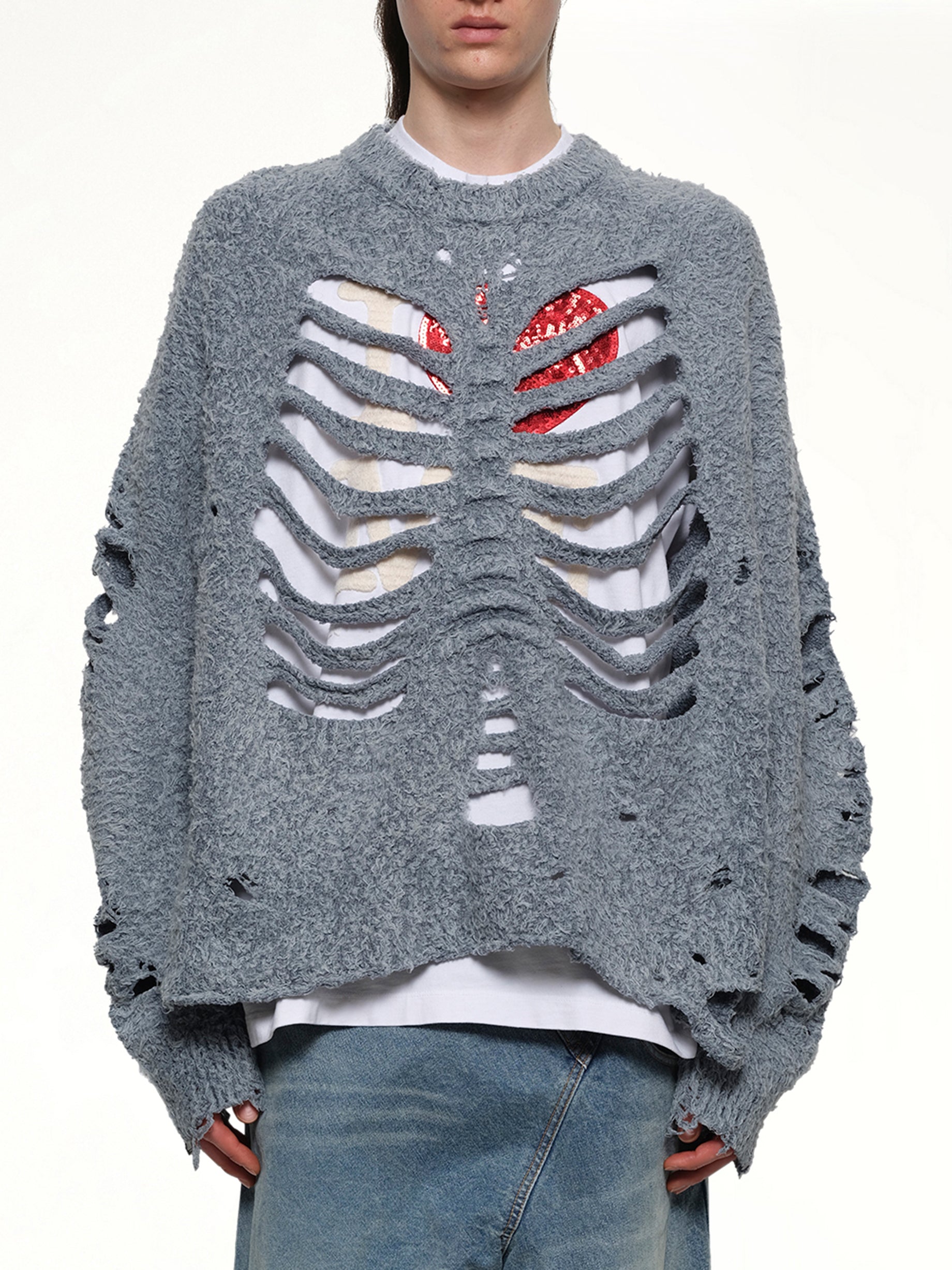 Image of a model wearing Outerwear. Productname: DOUBLET Ribcage Knit Pullover in BLUE colour by brand - DOUBLET