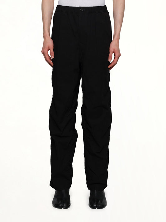 Image of a model wearing Pants. Productname: UNDERCOVER Casual Pants in BLACK colour by brand - UNDERCOVER