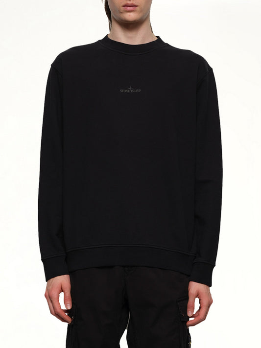 Image of a model wearing Outerwear. Product name - 610001 Industrial Four Sweatshirt in Black colour by brand - STONE ISLAND